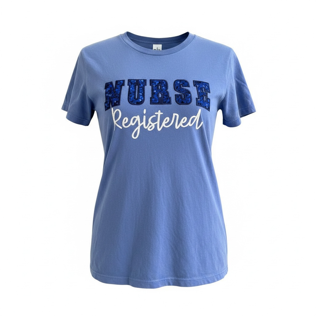 Captain Hawk Designs blue crewneck t-shirt with blue sequin NURSE text and white script Registered lettering.
